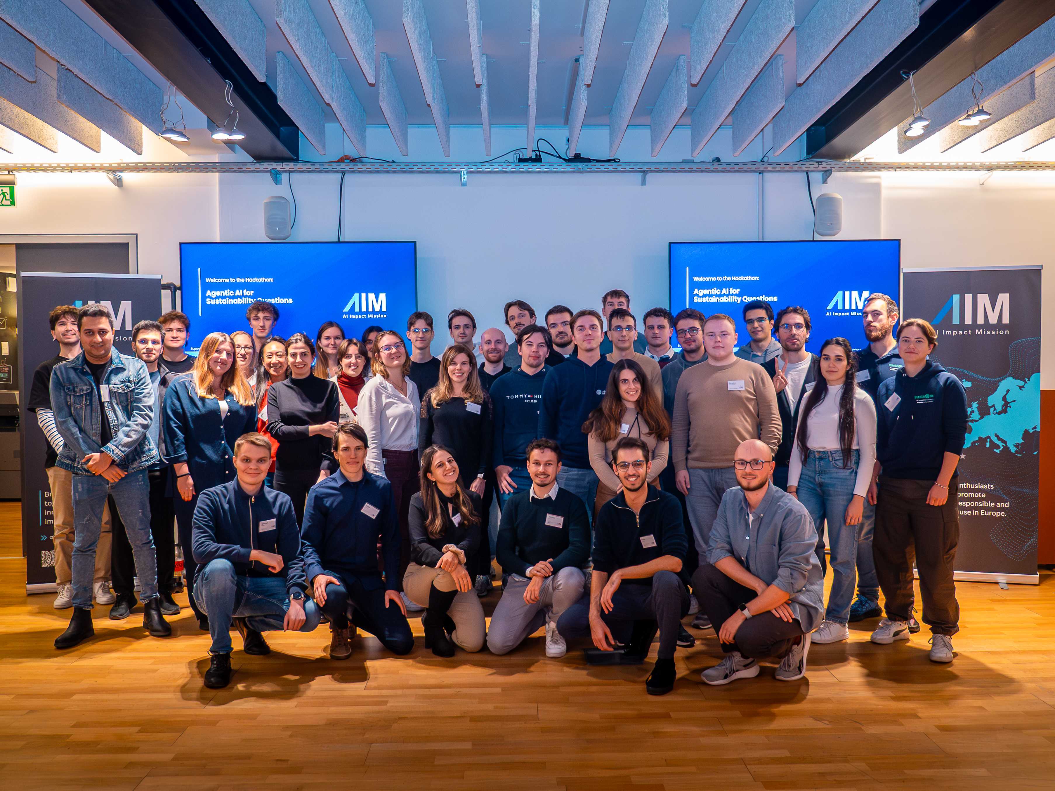 AIM Hackathon 3 at Impact Hub Vienna — participants building agentic AI for sustainability